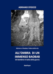 All ombra di un immenso baobab. Un bambino in balia della guerra