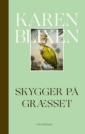 Skygger pa græsset